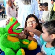 projeto-“dentista-na-escola”-reune-pais-e-filhos-das-escolas-municipais-da-regiao-sul-3.jpg